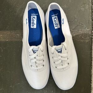 Keds, women’s size 5.5, white canvas sneakers.